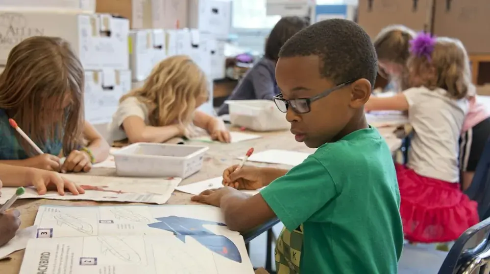 Inclusive classroom environment with neurodivergent learning spaces and visual supports